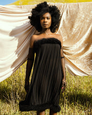 The EVE strapless dress evokes old Hollywood glam, crafted in a dreamy marabou fur trim, sheer chiffon & pleated detailing.