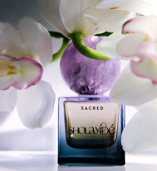 SACRED eco-luxe perfume, captivates you with an enigmatic sensuality composed of Orchids emboldened by a sultry base of Musk.