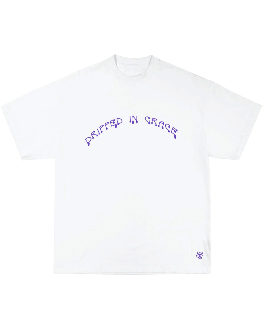 GRACE white t-shirt with purple Dripped in Grace embroidery detail by SHOLAYIDÉ laying on white background.